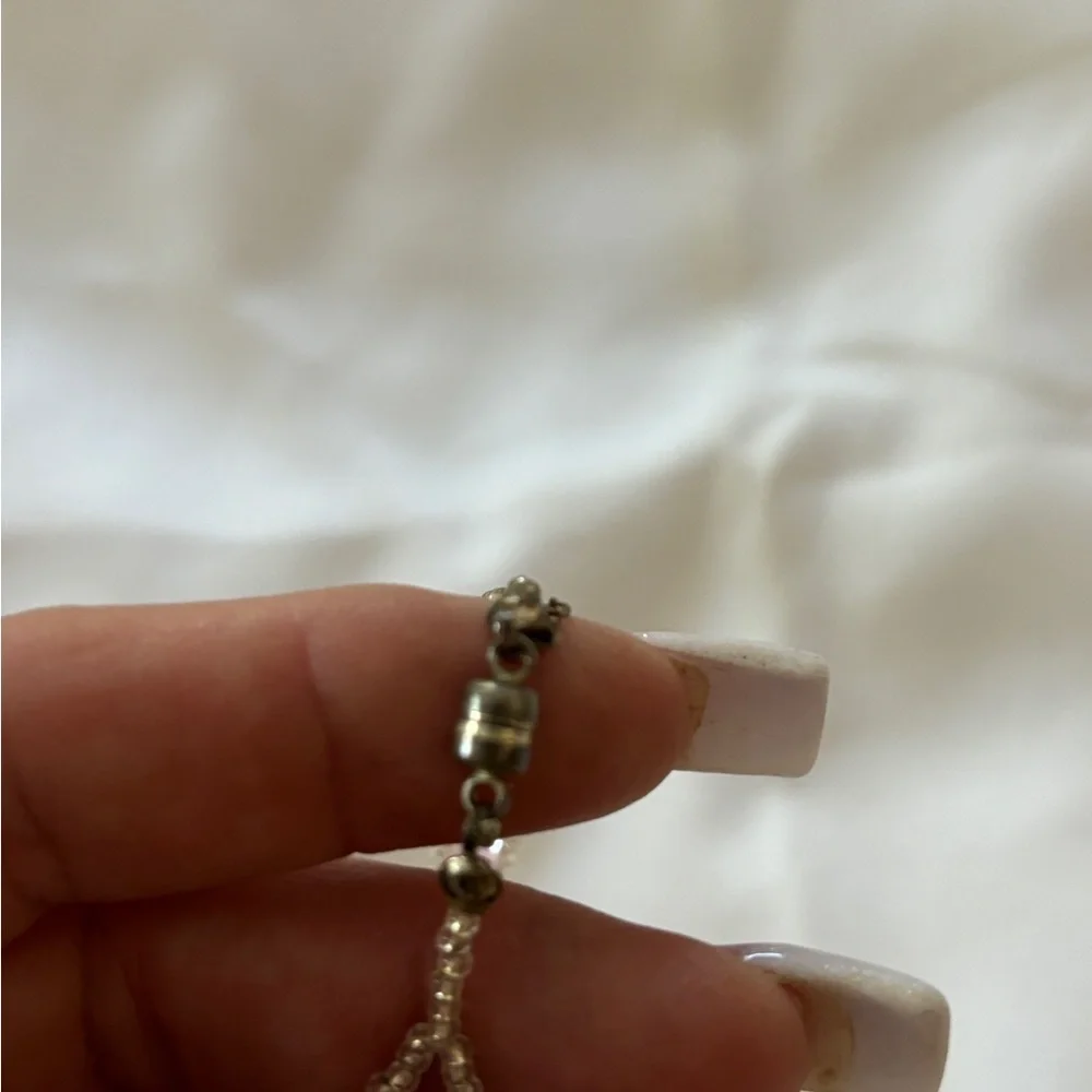 Note: safety chain broken but clasp‎ works
